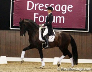 Alizee Froment on Mistral du Coussoul in a bitless bridle at the 2011 Global Dressage Forum :: Photo © Astrid Appels