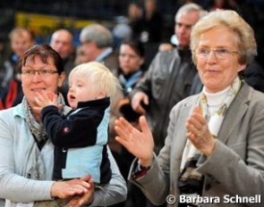 Isabell nanny Susanne Dumke holding Werth's child Frederik, flanked by her sponsor Madeleine Winter Schulze