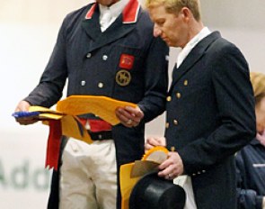 Winner Carl Hester and third placed Gareth Hughes have a look at Carl's British Grand Prix record scoring test