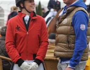 Charlotte Dujardin talks to her trainer and boss Carl Hester