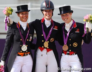 The 2012 Olympic individual dressage podium: Adelinde Cornelissen, Charlotte Dujardin, Laura Bechtolsheimer :: Photo © Astrid Appels