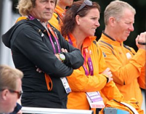 Dutch team coach Sjef Janssen watches Van der Meer compete