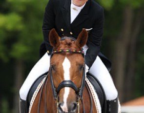 Charlott Maria Schurmann shows you how it is done. When you leave the arena you put a smile on your face, even if you are disappointed with your test. It reflects good on the judges and crowds and makes great photos !