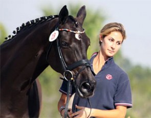 Caroline Roffman with Her Highness O (by  Hohenstein x Weltmeyer) at the job for the 2013 CDI-W Palm Beach Dressage Derby