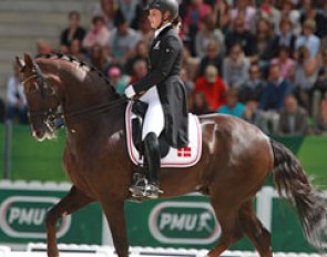 Danish Anna Kasprzak rode her Phil Collins' freestyle with Donnperignon who showed some of his best piaffe work ever. She lost some impulsion in the pirouettes and scope in the canter half passes