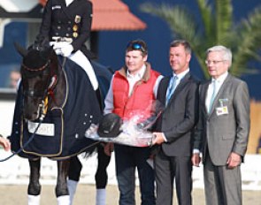 Kristina Sprehe on Desperados, an UVEX representative, dressage director Ulf Möller and judge at C Dieter Plewa at the prize giving for the Grand Prix for Special at the 2015 CDI Hagen :: Photo © Astrid Appels