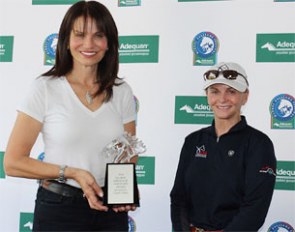 Carol Cohen presents the Global Dressage Visionary Award to U.S. Dressage Team Developing Coach and Olympian Debbie McDonald at the Adequan Global Dressage Festival