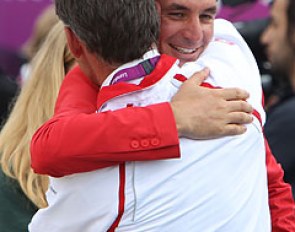 Steve Guerdat gets a big hug after winning gold