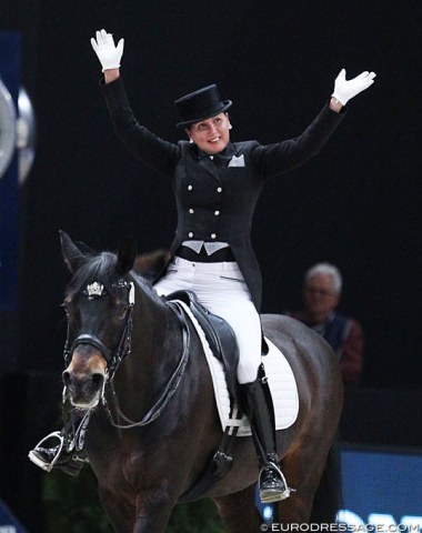 Inessa Merkulova waves to the crowds after she finishes her test on Mister X