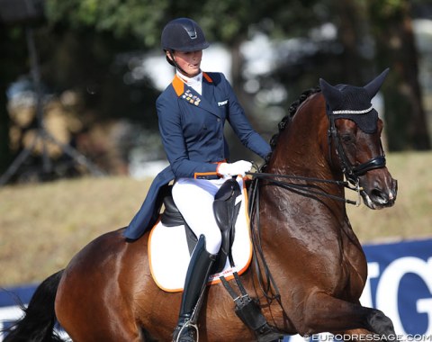 Dutch Milou Dees biting her tongue in concentration on her ride with Francesco