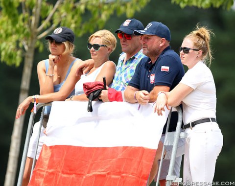Polish fans watch Lesner's ride in concentration