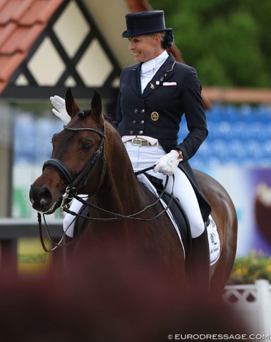 Anja Plönzke waves to the crowds as she leaves the arena with Fahrenheit