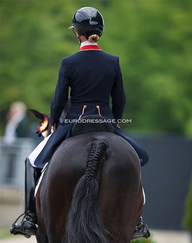 An old school braided tail. One doesn't see that too often anymore in the dressage arena