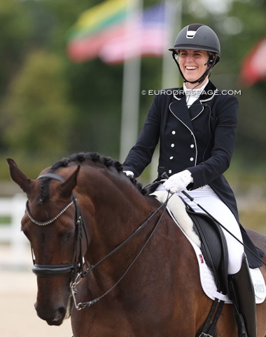 Big smile on Maxime Rozestraten's face. She's riding Rue Noblesse (by Rosentau x Cordoba)