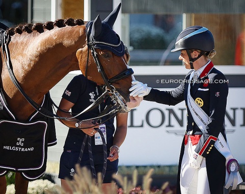 Charlotte Dujardin pats Imhotep in the prize giving ceremony
