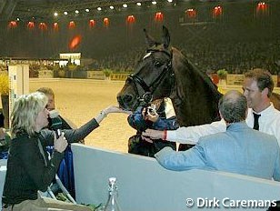 An injured Anky van Grunsven in crutches salutes TCN Partout at the 2003 Zwolle Stallion Show :: Photo © Dirk Caremans