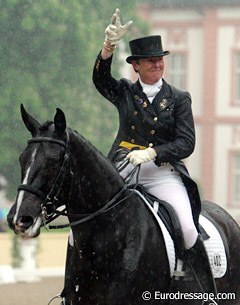Rain couldn't dampen Kyra Kyrklund's spirit. She looked happy with her ride on Max at the 2005 CDI Wiesbaden and got supportive applause from the crowds in the stands.