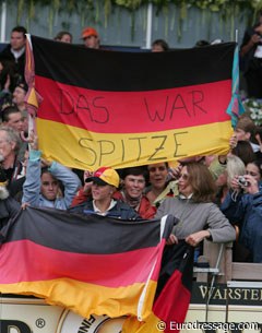 German fans waving a flag for their gold medal winning Isabell: The flag says, "that was top class"