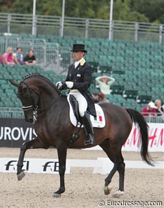 Italian Pierluigi "Piero" Sangiorgi aboard Flourian. What a lovely piaffe and passage does this horse have, but he didn't quite get the scores for it at the 2009 European Championships.