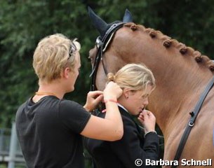 A (boy)friend fixing Sara Henriette Bergstrom Kallstrom's hair
