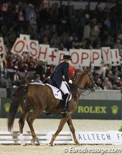 Canadian Ashley Holzer brought a big fan club to Kentucky: Go Ash + Poppy the sign reads. The duo finished 8th with 76.55%