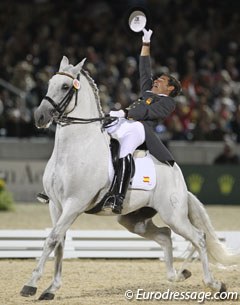 Juan Manuael Munoz Diaz cheers so hard that his horse spooks and he almost falls off