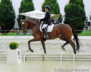 Esther Andres and Galetano brave the elements which turned the Avenches dressage ring into a pond on Saturday afternoon 17 September 2011