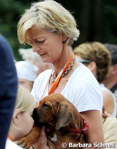 Ann Kathrin Linsenhoff with the latest acquisition to her family: a gorgeous Rhodesian Ridgeback puppy, apparently named Chewie
