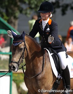 Sanne Vos is very happy with her freestyle ride on Champ of Class