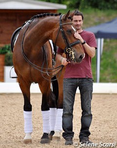 Isabell Werth's Spanish groom Guillem Barcelo with El Santo