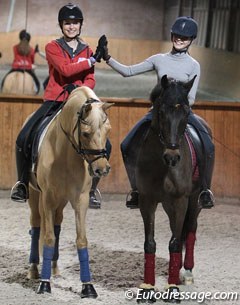 Anastasia Huet on Equestricon's Day of Diva and Lavinia Arl on Equestricon's Epiascer do a high five! :: Photo © Astrid Appels