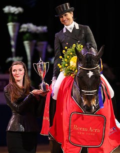Tinne Vilhelmson-Silfven and Don Auriello receives the trophy by Reem Acra rep Heather Schmidt at the 2012 CDI-W Stockholm :: Photo © Peter Zachrisson