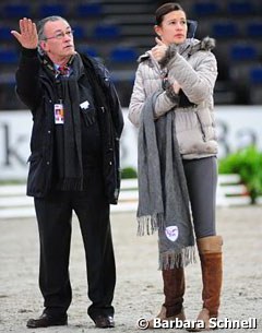 French chef d'equipe Alain Francqueville helps Jessica Michel with the sound check