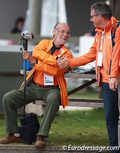 Adelinde's dad Wim Cornelissen shakes hands with Dutch team trainer Wim Ernes