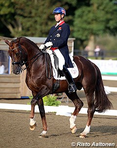Silver medallists Carl Hester and Fine Time