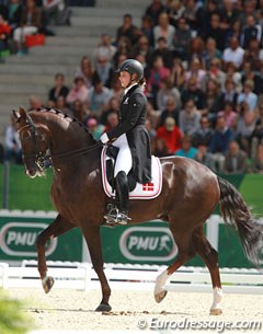 Danish Anna Kasprzak rode her Phil Collins' freestyle with Donnperignon who showed some of his best piaffe work ever. She lost some impulsion in the pirouettes and scope in the canter half passes