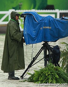Tv media working in rainy weather conditions at the 2014 World Equestrian Games :: Photo © Astrid Appels
