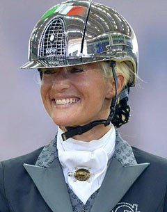 Silvia Rizzo struts the Crome Shine Silver Mirror KEP Italia helmet, which caught Valentino's attention at the 2015 CDI Doha