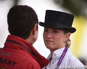 A teary eyed Morgan Barbançon gets a few words of comfort from Monica Theodorescu after Morgan had her last competition ride on Painted Black in Aachen
