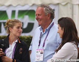 Morgan and Alexandra Barbançon Mestre with trainer Jan Nivelle, who coached them when they were riding ponies