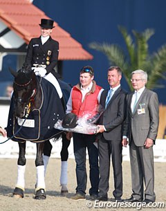 Kristina Sprehe on Desperados, an UVEX representative, dressage director Ulf Möller and judge at C Dieter Plewa at the prize giving for the Grand Prix for Special at the 2015 CDI Hagen :: Photo © Astrid Appels