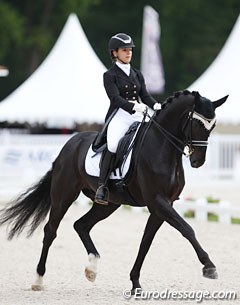 Swiss Carla Aeberhard on the 9-year old Swiss bred Delioh von Buchmatt (by Danone I x Wolkenstein II). Melanie Hofmann first competed the black  as a youngster and rode him at the 2013 and 2014 World YH Championships