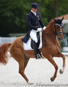 French Jean Philippe Siat and Marie-Christine Pointier's 10-year old Hanoverian mare Lovesong (by Locksley II x Wolkenstein II)