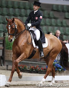 Poland's Rishat Sabitov on the Polish bred Azzaro. The gelding is very talented at Grand Prix but the piaffe is problematic and classically not correct with braking front legs and him leaning on the hindlegs (often seen with GP horses)