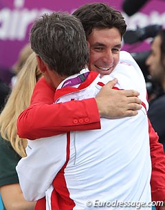 Steve Guerdat gets a big hug after winning gold