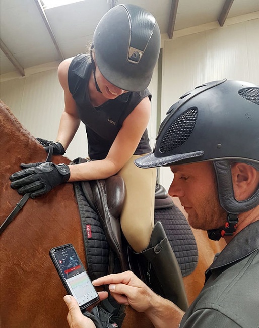 Tristan Tucker explaining the Hylofit heart rate monitor for rider and horse