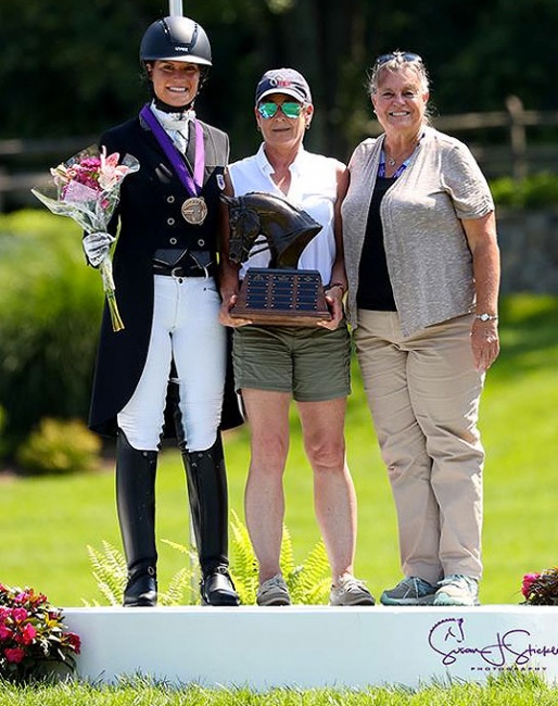 The Dressage Style Award and The Fiona Baan Memorial Trophy recipient Callie Jones with Roberta Williams (center), USDF FEI Junior and Young Rider Committee Chair, and Katherine Robertson, USDF Education Department Manager (right) :: Photo © Sue Stickle