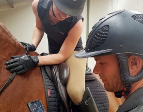 Tristan Tucker explaining the Hylofit heart rate monitor for rider and horse