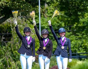 North American Junior Dressage Freestyle medalists from left to right: Bianca Schmidt (silver), Chase Robertson (gold), and Caroline Garren (bronze)  :: Photo © Sue Stickle