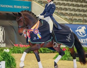  Nora Batchelder and Fifi MLW enjoy their victory lap for the Prix St. Georges Open Championship at the 2018 US Dressage Finals :: Photo © Sue Stickle